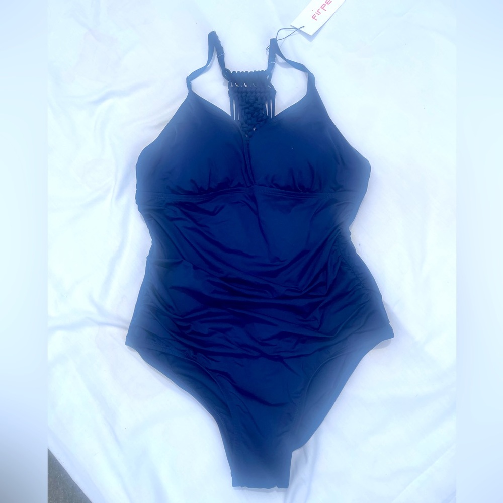 New with tags, navy blue maternity swimsuit with crochet detail in the back.